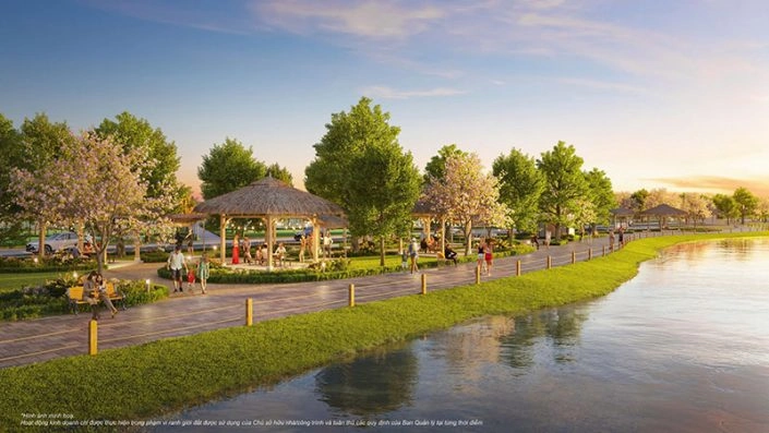Đường dạo bộ ven sông với chòi nghỉ mát và hàng cây xanh rợp bóng